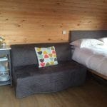 Sofa in Meadowsweet Pod - Bradley Hall Rural Escapes - Glamping in Cheshire