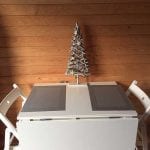 A Christmas tree in the pod at Winter Scene at Bradley Hall Rural Escapes - Glamping in Cheshire