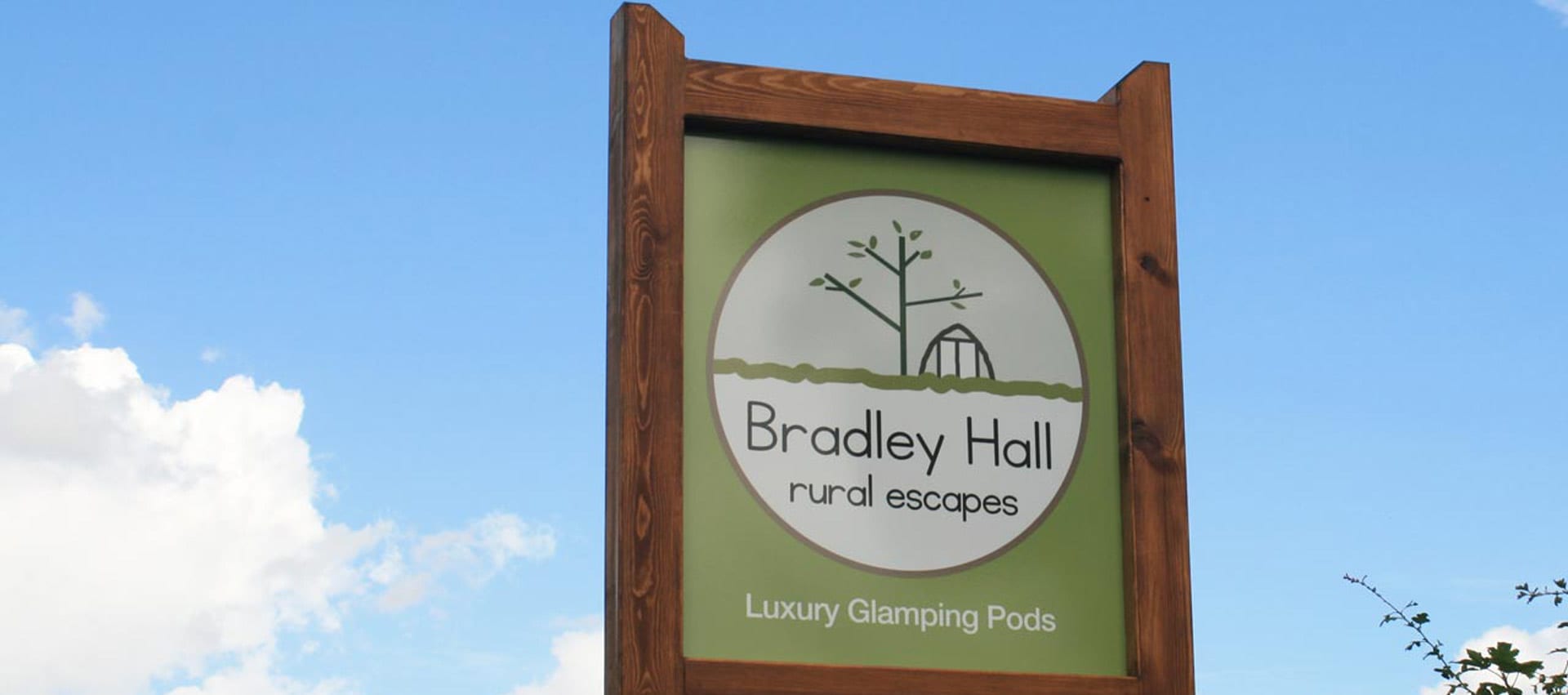 Signpost at Bradley Hall Rural Escapes - Luxurious Glamping Pods on a working farm in Cheshire